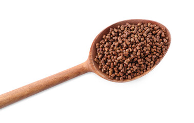 Wooden spoon with buckwheat tea granules on white background, top view