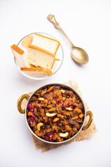 bread halwa also called halva, sheera, pudding or suji is an instant sweet dish from India