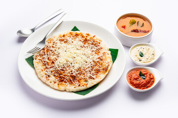 Cheese uttapam pizza, south Indian food with a twist. served with sambar and chutney