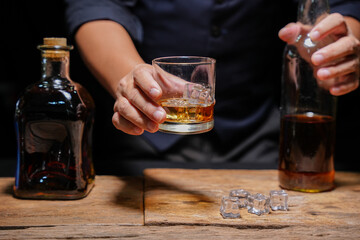 Barman pouring whiskey whiskey glass beautiful night