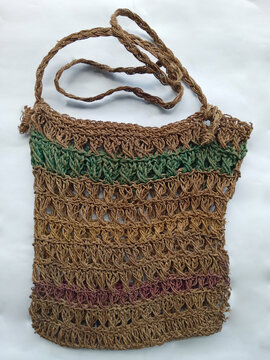 a traditional small bag called noken made from woven bark