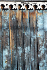 Wood taxture background, old boards with peeling blue paint