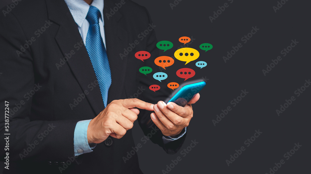 Poster close-up of hands using mobile phone with colorful chat icons on application communication digital w