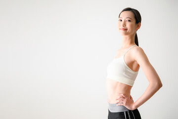 Asian woman toned by exercise