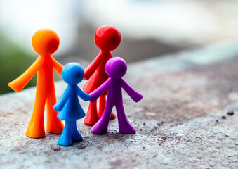 Representation of a family, father, mother and children through dolls