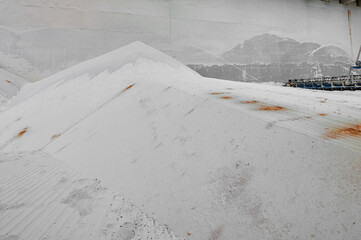 Piles of chemical fertilizers stored at production plant