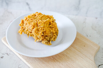 Fried chicken crisp, fast food meal on a white plate 