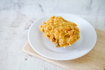 Fried chicken crisp, fast food meal on a white plate 