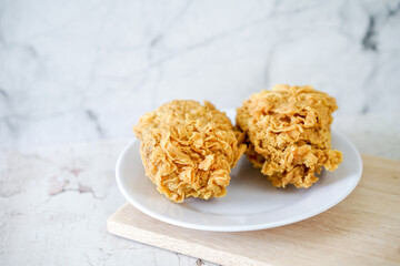 Fried chicken crisp, fast food meal on a white plate 