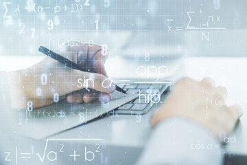 Double exposure of creative scientific formula concept with hand writing in notebook on background...