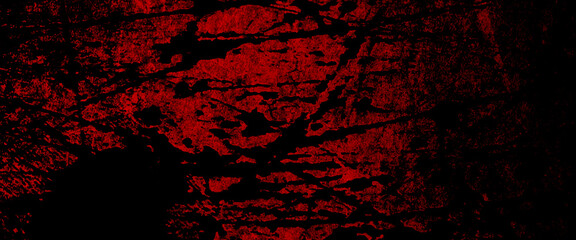 Fototapeta premium Grunge halloween background with blood splash space on wall, dark slate background toned classic red and black color, dark slate background toned classic red and black color. 