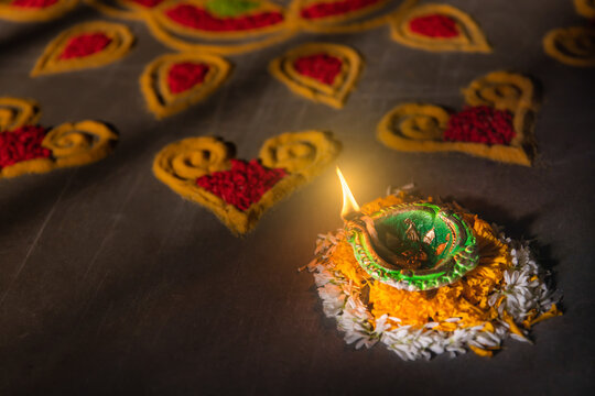 Happy Diwali - Diya lamps lit during diwali celebration
