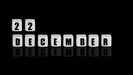 December 22th. Day 22 of month, Calendar date. White cubes with text on black background with reflection.Winter month, day of year concept