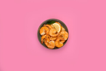 Shrimps on color background.