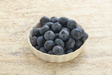 Sweet ripe blueberry heap in the bowl