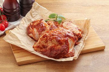 Marinated chicken leg in tomato sauce