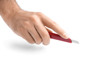 Man with red utility knife on white background