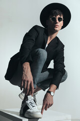 full body picture of cool fashion man with hat and sunglasses