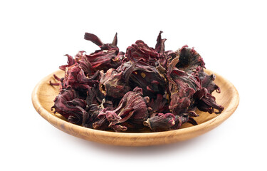 dry red roselle fruits or hibiscus sabdariffa in wood plate isolated on white background. dry red roselle fruits flower or hibiscus sabdariffa                                            