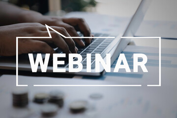 Person using a laptop computer for online training webinars. E-learning browsing connection and cloud online technology webcast concept. Laptop mockup with clipping path on screen.