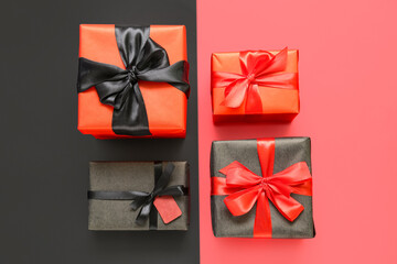 Gift boxes on color background. Black Friday sale