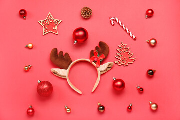 Christmas reindeer horns with decor on red background