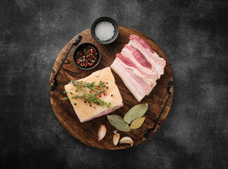 Korean Traditional BBQ Pork. Raw Pork belly. Fresh pork belly, salt, pepper and garlic on wooden board