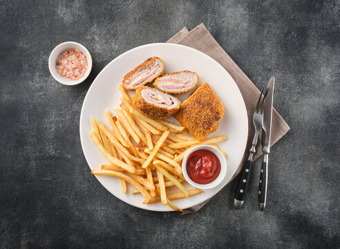 Chicken cordon bleu is made from chicken breast fillet, smoked beef, mozzarella cheese then rolled and wrapped with breadcrumbs and fried