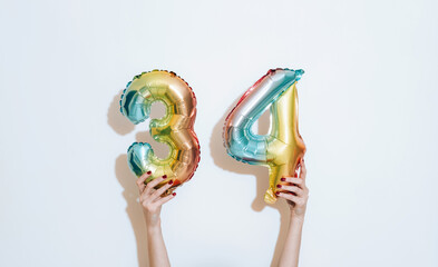 34 Years Anniversary Celebration. Happy 34th birthday foil balloon greeting. Happy Birthday Card