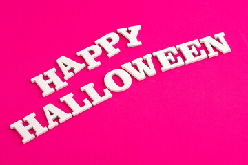 Happy halloween - title in letters on purple background