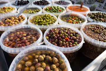 Pickled olives of different varieties at the bazaar.
