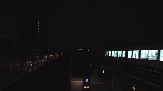 Copenhagen, Denmark The Copenhagen Metro on an elevated track in the Orestad district at night. 