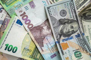 100 european money, 100 dollar and 1000 ukrainian hryvnia uah exchange concept, finance background.