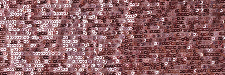 Rectangular red shiny fabric with sequins closeup