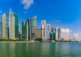 Fototapeta na wymiar Panorama with downtown skyscrapers of the city business district skyline at Marina Bay in Singapore