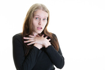 young woman hands on chest surprised face offended with open mouth long blond hair on white background