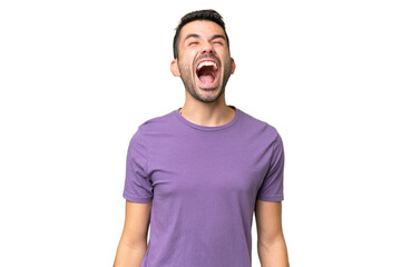 Fototapeta premium Young handsome caucasian man over isolated background shouting to the front with mouth wide open