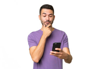 Young handsome caucasian man over isolated background thinking and sending a message