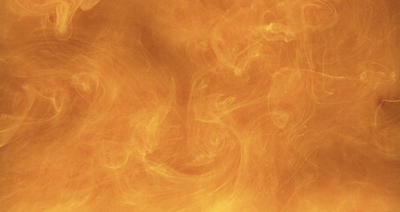 Color smoke cloud. Ink water texture. Steam flow. Orange yellow glowing vapor swirl floating bright abstract art copy space background.