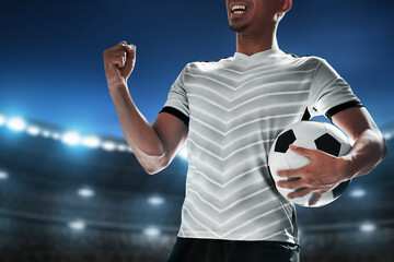 Naklejka premium Soccer player celebration in the stadium