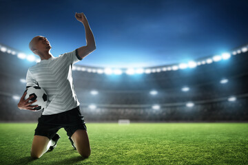 Naklejka premium Soccer player celebration in the stadium