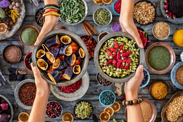 Dried vegetables at the hands of two women