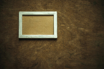 Wooden frame in the style of shabby chic in white. Making photos in a vintage museum. Horizontal...