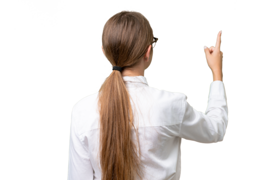 Young business caucasian woman over isolated background pointing back with the index finger