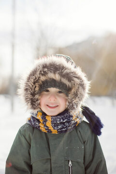 Cute smiling boy wearing warm clothing