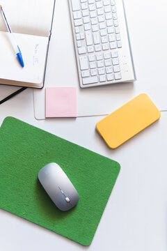 Wireless technologies with diary on desk at office