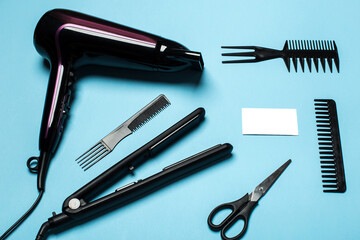 combs and hairdresser tools on blue background top viewcombs and hairdresser tools on blue background top view