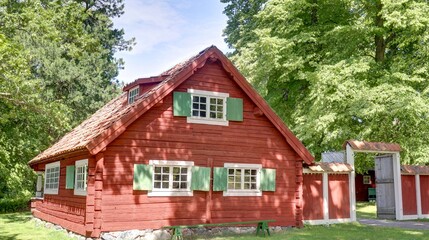 Fototapeta na wymiar maison traditionnelle rouge de suède en Scandinavie