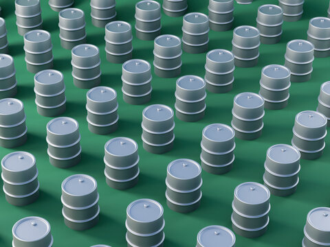 Three dimensional pattern of gray oil drums standing against green background