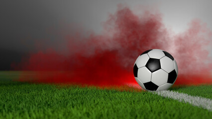 Fußball auf dem Rasen mit rotem Rauch